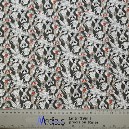 The Medicus Scrub Caps TV Cartoon Looney Tunes Bugs Bunny Scrub Cap features expressive Bugs Bunny faces on a dark gray background, with a ruler for scale.