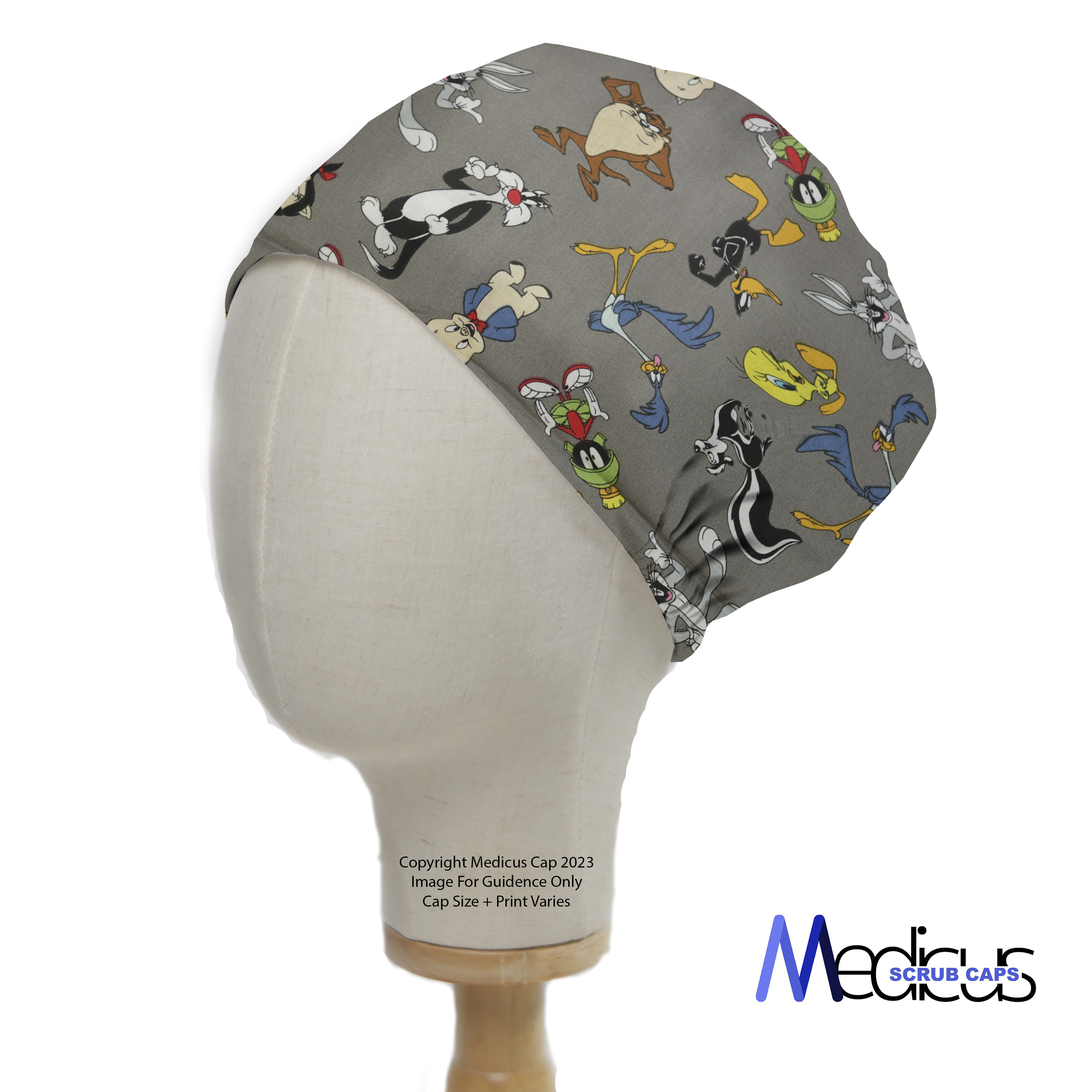 The TV Cartoon Looney Tunes Character Mashup on Grey Scrub Cap by Medicus Scrub Caps showcases beloved characters on sustainable medical attire, displayed on a mannequin head.