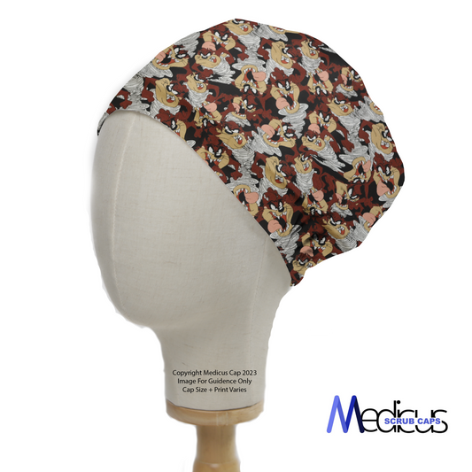 A mannequin head displays a Medicus Scrub Caps product: the TV Cartoon Looney Tunes Tasmanian Devil Scrub Cap, featuring a playful camouflage-themed character print.