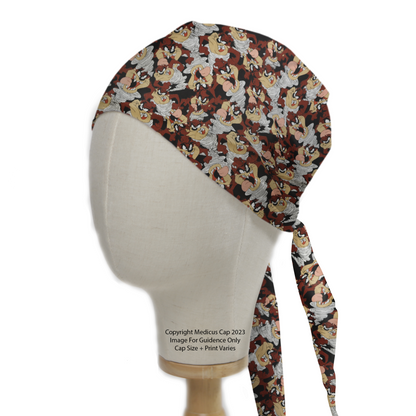 Medicus Scrub Caps TV Cartoon Looney Tunes Tasmanian Devil Scrub Cap on a mannequin head, featuring a lively brown, red, and beige cartoon pattern with tie strings.