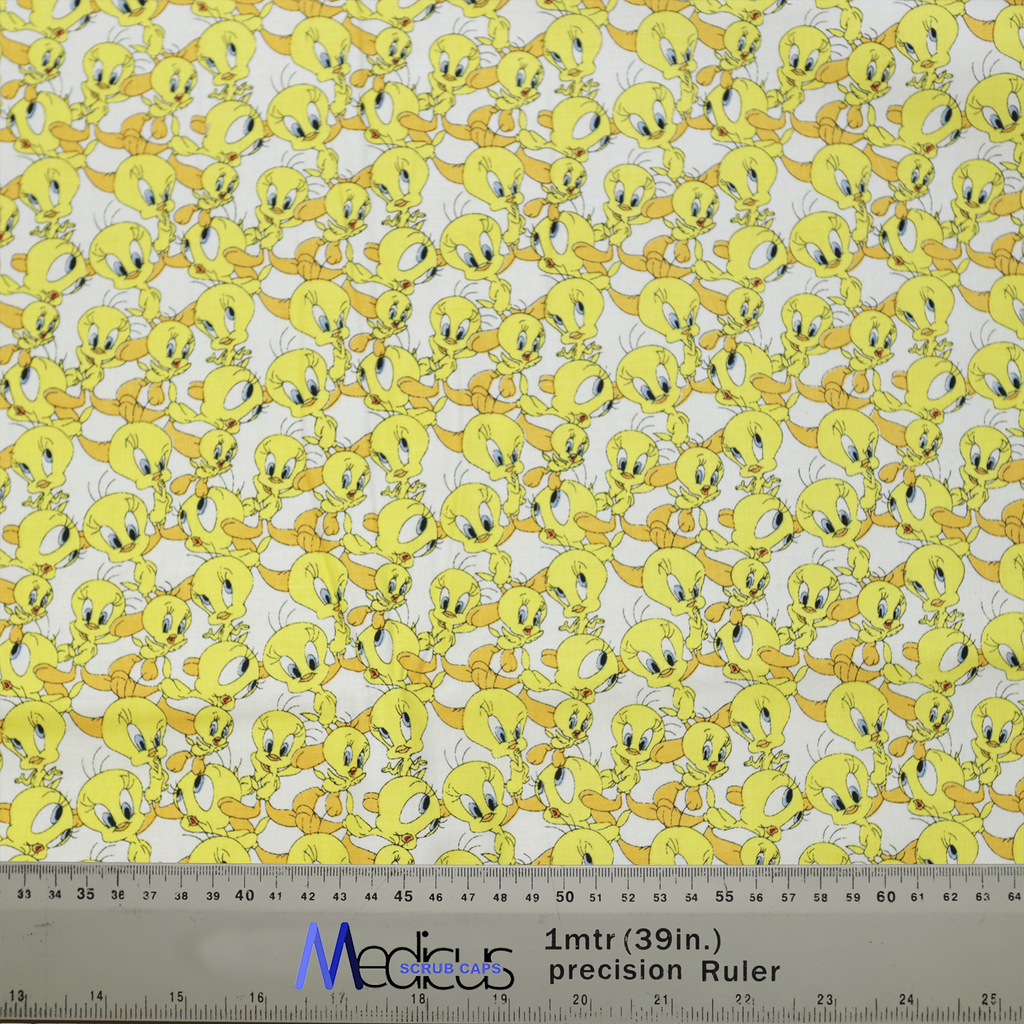 The TV Cartoon Looney Tunes Tweety Bird Scrub Cap by Medicus Scrub Caps features a playful Tweety pattern, perfect for adding fun to medical wear.