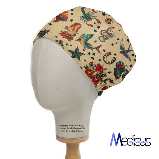 Tattoos #3 Sea Pirates Scrub Cap by Medicus Scrub Caps, featuring vintage tattoo-style roses, birds, and skulls on beige fabric, displayed on a mannequin head.