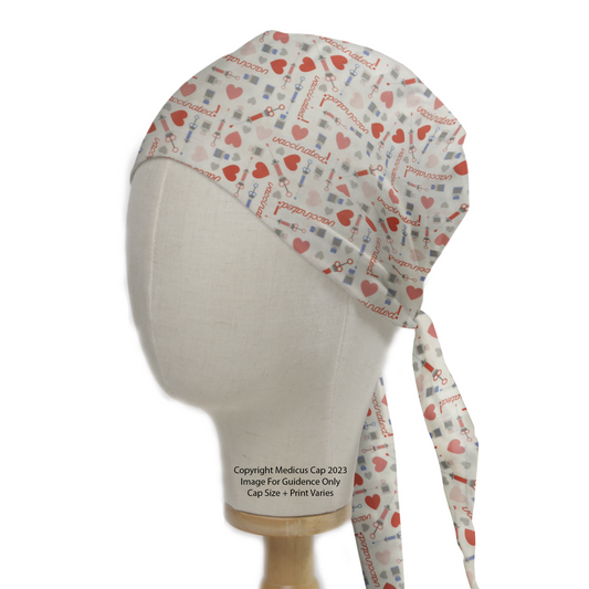 Covid Vaccine Love Scrub Cap from Medicus Scrub Caps, featuring a medical-themed pattern with hearts, syringes, and "vaccinated" text on a white background.