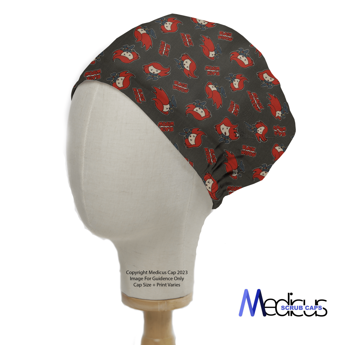 A mannequin head wears a Medicus Scrub Caps Black Widow Red Kawaii Superhero Scrub Cap adorned with red and beige cartoon characters and text. Its dark hue contrasts the light wood base, enhanced by the logo at the bottom right for a superhero style flair.