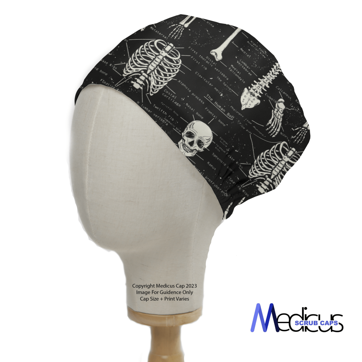Introducing the Bones Anatomy Scrub Cap by Medicus Scrub Caps, featuring a striking black design with white anatomical skeletons like skulls and rib cages. Displayed on a mannequin head, this eco-friendly cap is part of our collection, blending style with sustainability and even glows in the dark!.