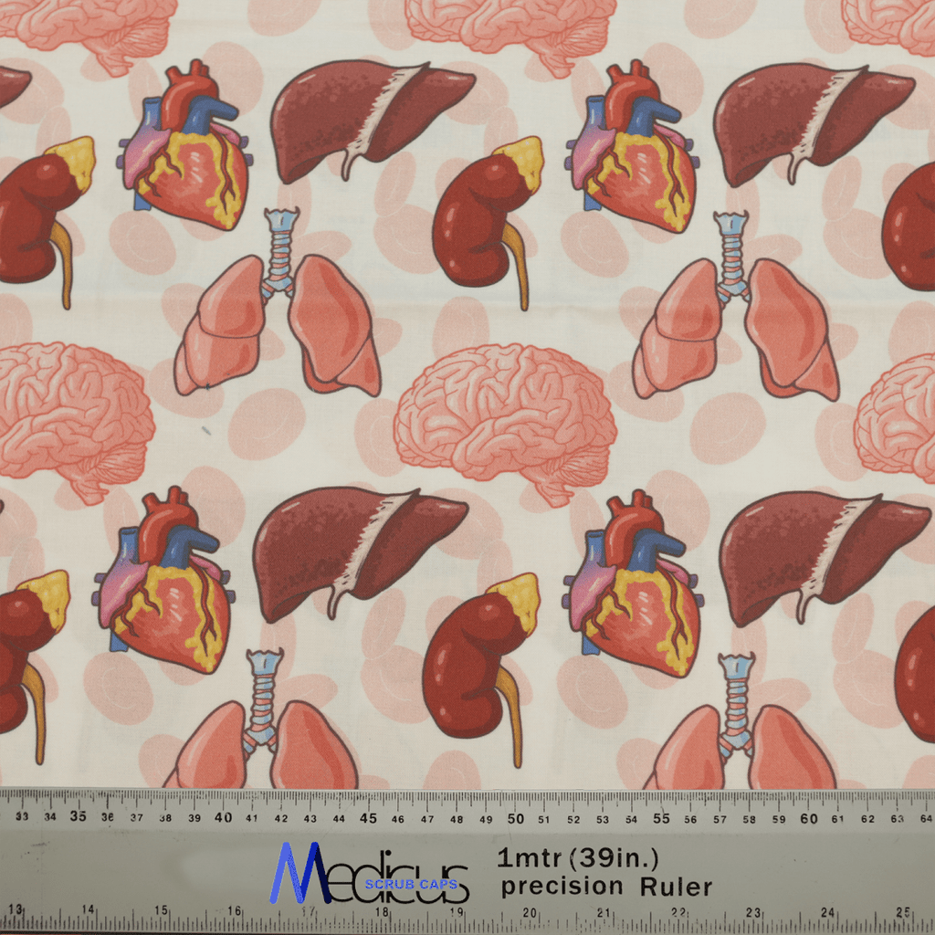 The Medicus Scrub Caps Brain Heart Kidney Liver Scrub Cap is made from patterned hypoallergenic 100% cotton, showcasing organs like hearts, brains, lungs, kidneys, and livers on a light background with circular accents. Ideal for eco-friendly healthcare use; includes an inch ruler at the bottom.