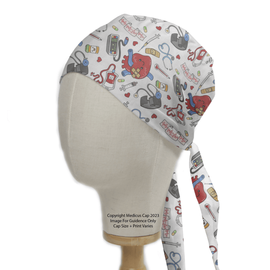 A mannequin dons the Medicus Scrub Caps Cardiac Heart Surgeon Kit Scrub Cap, featuring vibrant stethoscopes, syringes, hearts, and pills. Ties dangle at the back, completing this essential medical-themed attire for cardiac surgery.