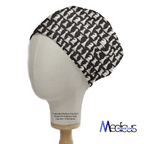 Chess Pieces Classic Black + White scrub cap shown on mannequin head