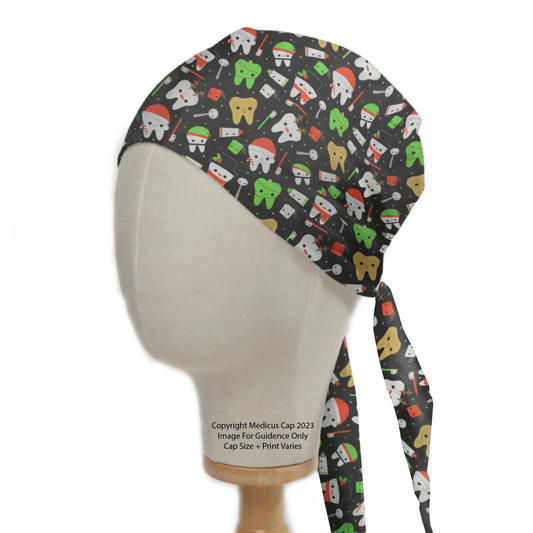 A mannequin head showcases the Christmas Dental Santa scrub cap by Medicus Scrub Caps, combining comfort with festive style. The dark fabric displays colorful teeth and dental tools, ideal for healthcare professionals. It ties at the back for practicality and seasonal spirit.