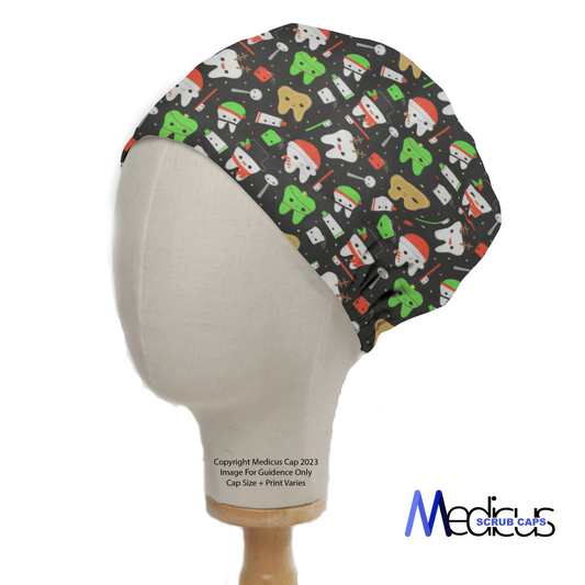 A mannequin head displays the Christmas Dental Santa Scrub Cap by Medicus Scrub Caps, featuring a festive dental theme with toothbrushes and teeth on a black background. Designed for comfort, the Medicus Scrub Caps logo is in the lower right corner.