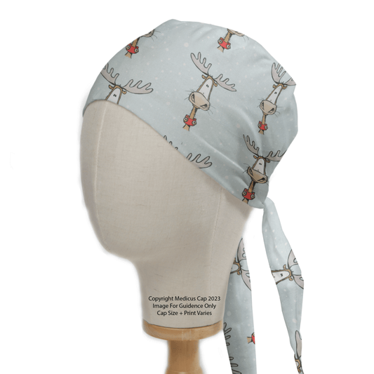 Displayed on a mannequin head, the Medicus Scrub Caps Christmas Reindeer Big Scrub Cap showcases a festive tie-back design with reindeers and snowflakes, combining winter charm and comfort for stylish holiday healthcare attire.