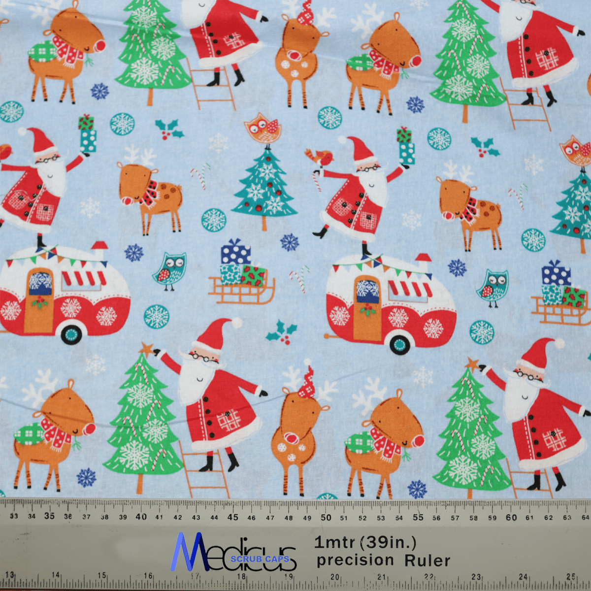 The eco-friendly Medicus Scrub Caps Christmas Reindeer Santa Scrub Cap boasts festive images of Santa, reindeer, Christmas trees, and holiday-themed cars on a light blue background. A 1-meter ruler is featured at the bottom for scale.