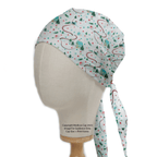 Christmas Winter House scrub cap shown on mannequin head