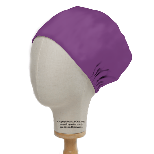 A mannequin head displays the Classic Plain Imperial Purple Scrub Cap by Medicus Scrub Caps, illustrating healthcare attire known for its comfort and durability. The cap covers the top and sides of the head, mounted on a wooden stand. Image © Medicus Scrub Caps 2022.