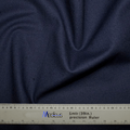 A Classic Plain Navy Scrub Cap from Medicus Scrub Caps, with visible folds, is shown with a gray precision ruler measuring up to 1 meter (39 inches) labeled Medicus, highlighting the attention to detail appreciated by healthcare professionals for achieving a custom fit.