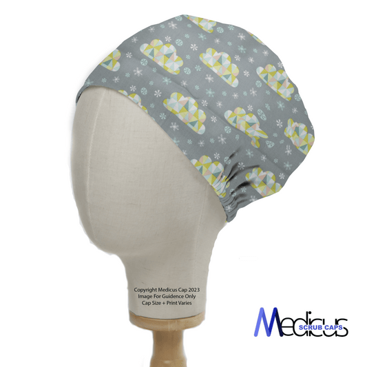 A mannequin head displays the Clouds Abstract Stars Scrub Cap, showcasing colorful geometric clouds, snowflakes, and abstract stars. The bottom right features the Medicus Scrub Caps logo, celebrating celestial elegance and honoring healthcare heroes.