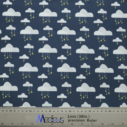Medicus Scrub Caps presents the Clouds and Stars Scrub Cap, featuring dark blue fabric with white clouds raining yellow stars and lightning bolts, perfect for adding celestial beauty to healthcare professionals. A ruler at the bottom shows the designs scale.