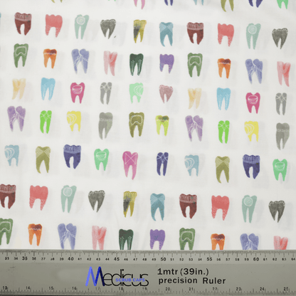 Featuring a vibrant pattern of illustrated teeth in various shades on white fabric, the Medicus Scrub Caps Colourful Tooth Dentist Scrub Cap is ideal for dental professionals. A ruler with inches and centimeters indicates scale at the bottom.