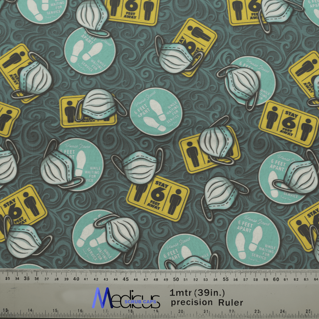 The Covid Masks Social Distancing Scrub Cap by Medicus Scrub Caps features fabric with images of masks, Stay 6 ft apart signs, rulers in white and yellow, and handwashing symbols. It includes a 1 meter/39 inch ruler for scale—ideal for themed scrub caps in socially distant times.