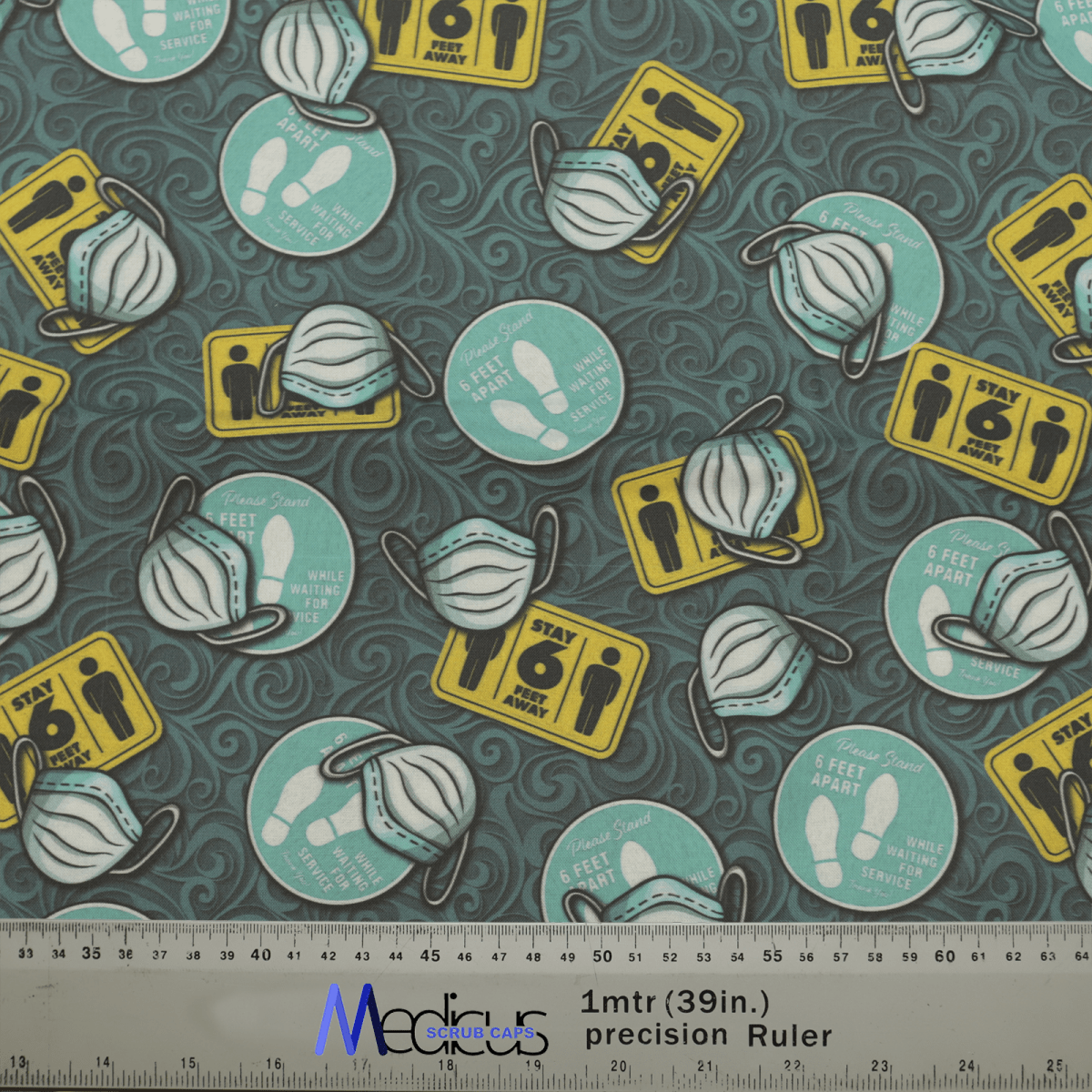 The Covid Masks Social Distancing Scrub Cap by Medicus Scrub Caps features fabric with images of masks, Stay 6 ft apart signs, rulers in white and yellow, and handwashing symbols. It includes a 1 meter/39 inch ruler for scale—ideal for themed scrub caps in socially distant times.