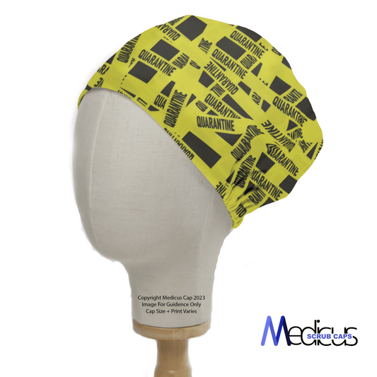 The Covid Quarantine Tape Scrub Cap by Medicus Scrub Caps features yellow fabric with black "QUARANTINE" text and symbols, resembling caution tape. Displayed on a mannequin head.