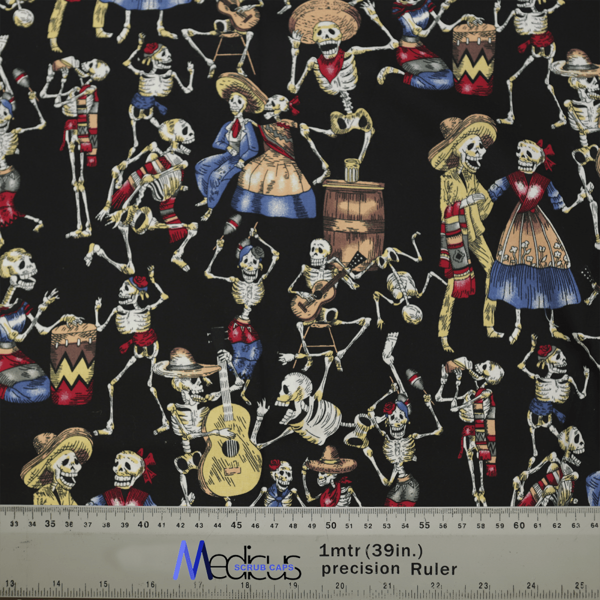The Medicus Scrub Caps Day Of The Dead Dancing Skeletons scrub cap features a vibrant Day of the Dead pattern with skeletons in colorful attire playing instruments and dancing on a festive black background, complete with a measuring ruler at the bottom.