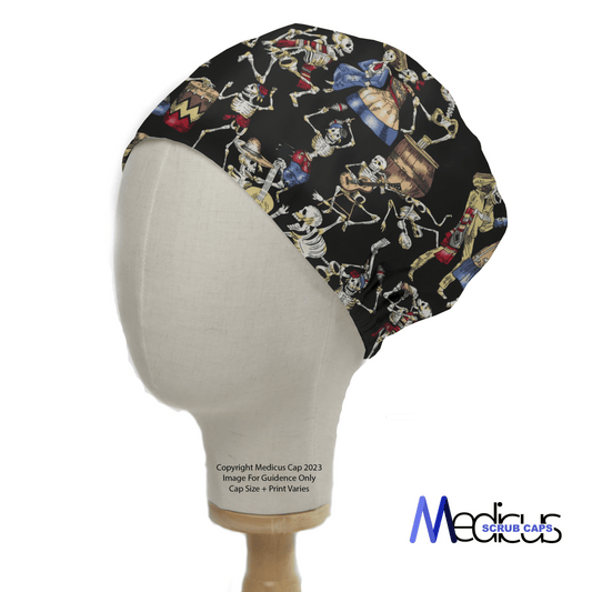 The Day Of The Dead Dancing Skeletons Scrub Cap by Medicus Scrub Caps, displayed on a mannequin head, features dancing skeletons and Day of the Dead pirate themes showcasing skeletons, treasure chests, and nautical motifs on a black background with the brand name in the bottom right corner.