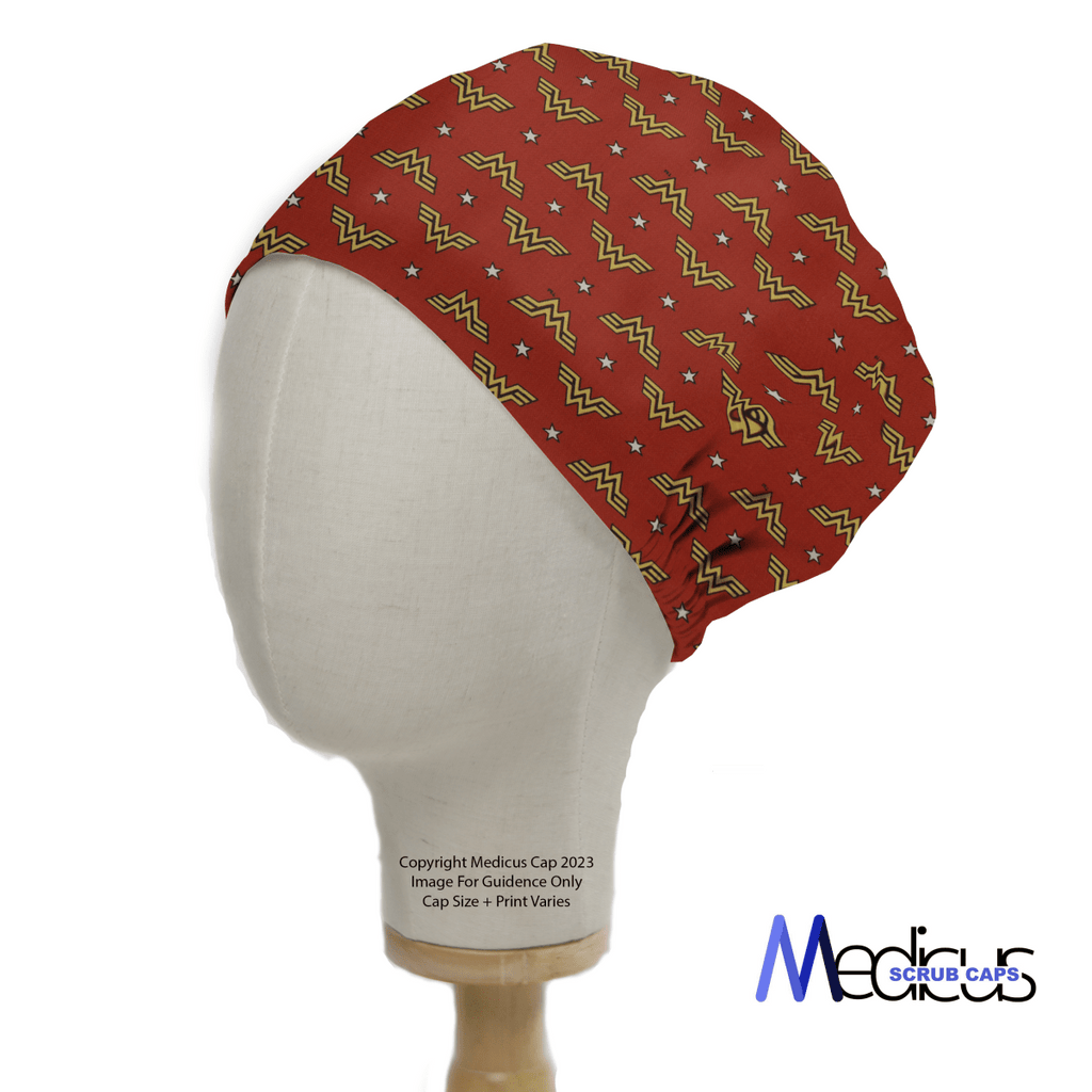 The DC Wonder Woman Symbol WW On Red Scrub Cap from Medicus Scrub Caps, featuring yellow logos and stars, displayed on a mannequin head. Ideal for healthcare professionals.