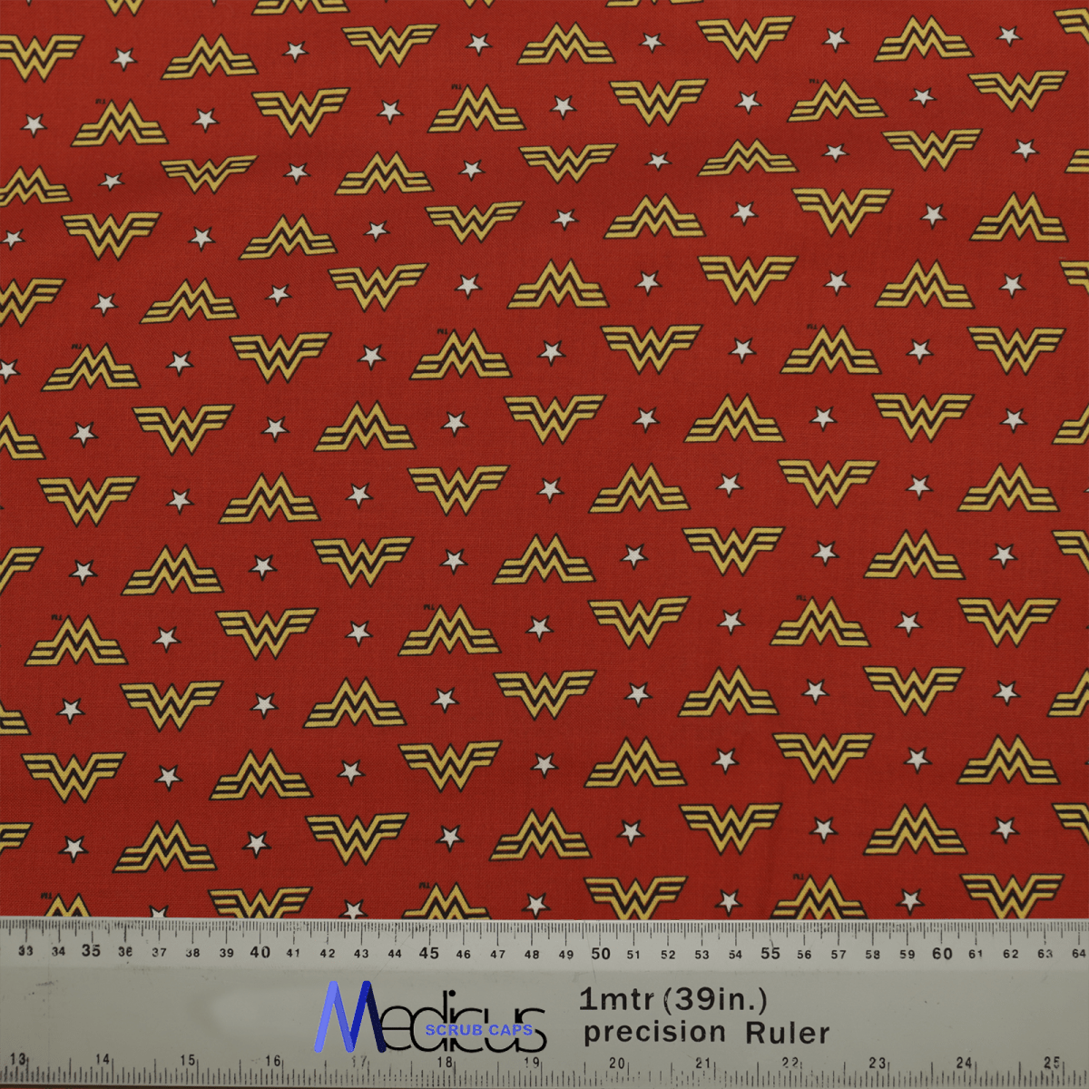 The DC Wonder Woman Symbol WW On Red Scrub Cap by Medicus Scrub Caps features yellow logos, white stars, and a precision ruler for scale.