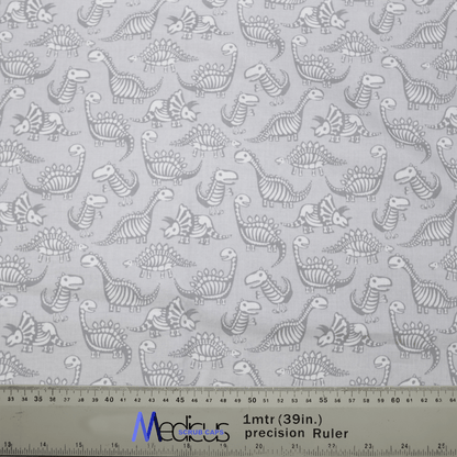 The Dinosaur Dig #2 Scrub Cap by Medicus Scrub Caps features a pattern of dinosaur skeletons like Stegosaurus and Triceratops on a light backdrop, with a ruler showing 1mtr (39in.) precision. Ideal for crafting scrub caps for those passionate about prehistoric creatures.