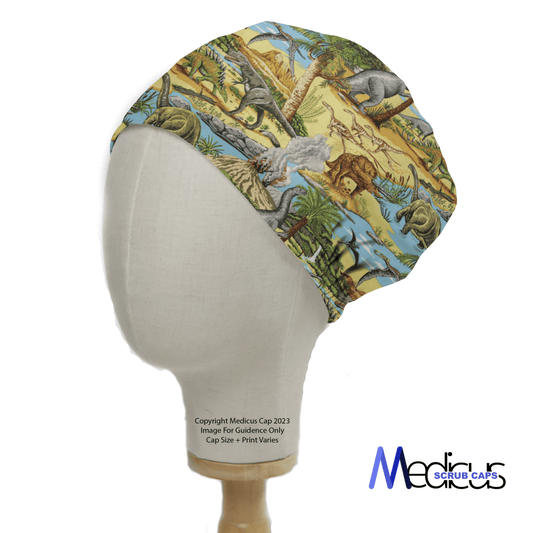 The Dinosaurs Lost In Time #1 Scrub Cap by Medicus Scrub Caps is modeled on a mannequin, featuring various dinosaurs in a prehistoric scene. The cap highlights the Medicus logo at the bottom right.