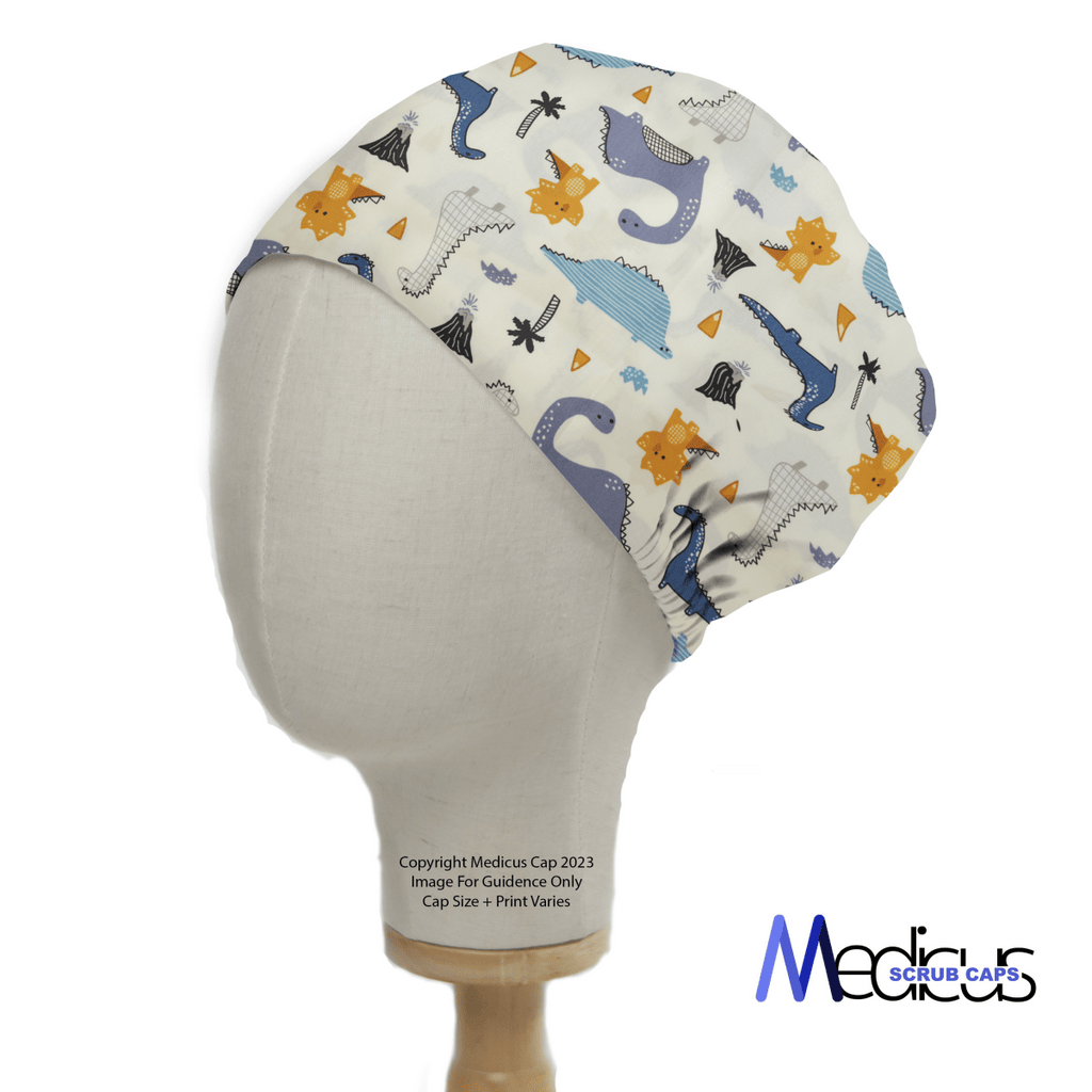 A mannequin head models a whimsical Dinosaurs Purple Blue Orange Scrub Cap with geometric patterns, perfect for healthcare professionals. It covers the head and part of the forehead, featuring Medicus Scrub Caps subtly printed at the bottom right for an adventurous touch.
