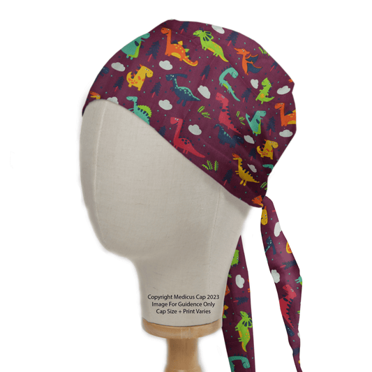 A mannequin head displays a Dinosaurs Purple Scrub Cap by Medicus Scrub Caps, featuring vibrant multicolored dinosaurs and white clouds on a maroon background, with ties hanging gracefully at the back—perfect for healthcare professionals.