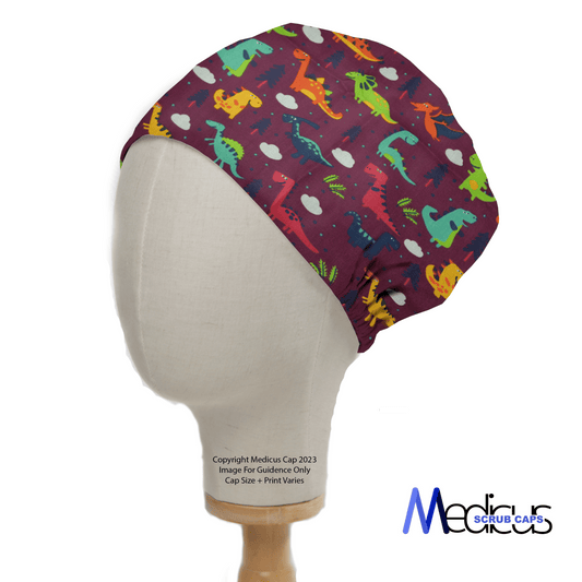 The Dinosaurs Purple Scrub Cap by Medicus Scrub Caps features a vibrant dinosaur pattern in orange, yellow, blue, and green under white clouds, ideal for healthcare professionals with a passion for paleontology. Displayed on a mannequin head with the brand logo at the bottom right.