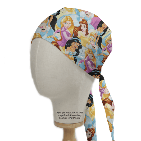 A mannequin displays the Disney Princesses Gang Scrub Cap from Medicus Scrub Caps, featuring animated princesses in bright outfits on a light blue background for a charming, practical look.