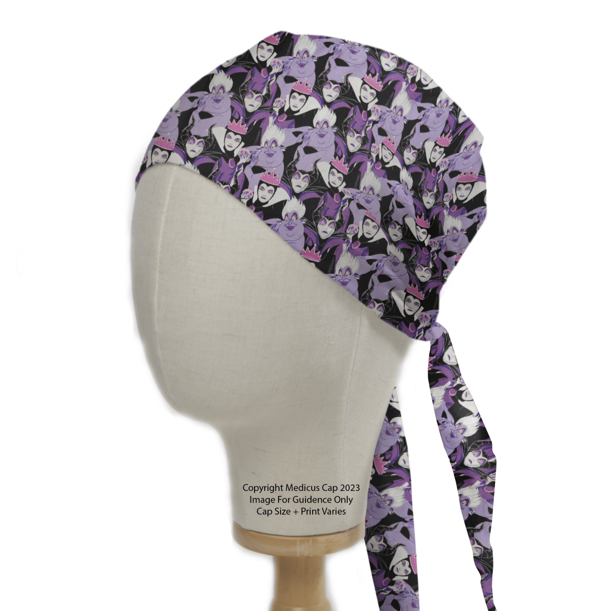 A Medicus Scrub Caps mannequin head displays the Disney Villains Scrub Cap, featuring a black, purple, and lavender pattern. Ideal for healthcare professionals, it ties in the back and includes a copyright notice at the bottom.