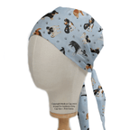 Dog Toss On Light Blue scrub cap shown on mannequin head