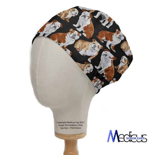 A mannequin head displays the Dogs British Bulldog Scrub Cap by Medicus Scrub Caps, featuring British Bulldogs on a black background—a sustainable choice for style and function.