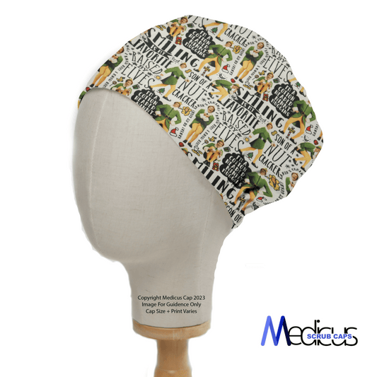 A mannequin head models a Medicus Scrub Cap featuring a playful design with vibrant comic-style text and illustrations on a white background, ensuring superior comfort similar to Elf The Movie Scrub Cap styles.