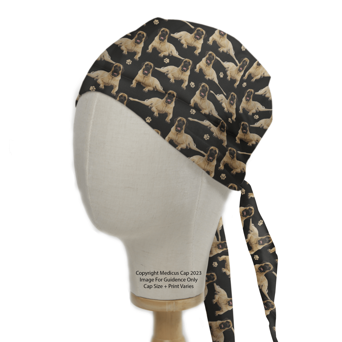 The English Bull Mastiff Dogs Black Scrub Cap from Medicus Scrub Caps features tan dogs and paw prints on black, with long ties at the back. Note: Copyright Medicus Cap 2023 Image For Guidance Only Cap Size + Print Varies. Ideal for adding a playful touch to your healthcare routine.