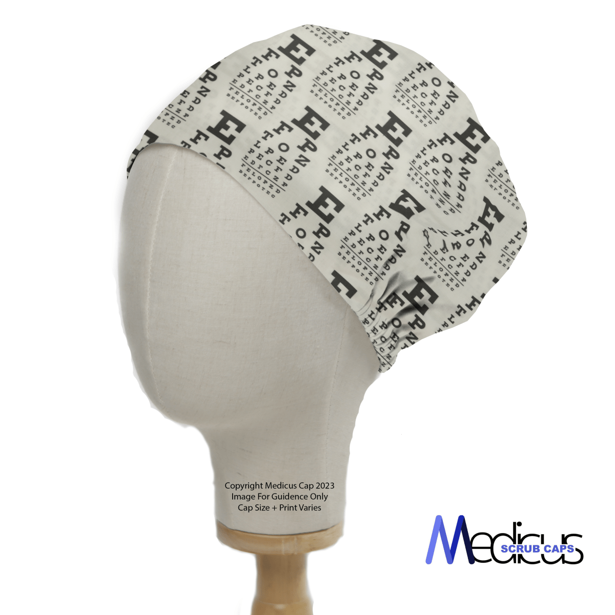 The Eye Chart Test Scrub Cap by Medicus Scrub Caps is showcased on a mannequin head, perfect for healthcare professionals. It displays rows of diminishing letters on a plain, light-colored fabric with Medicus Scrub Caps at the bottom right.