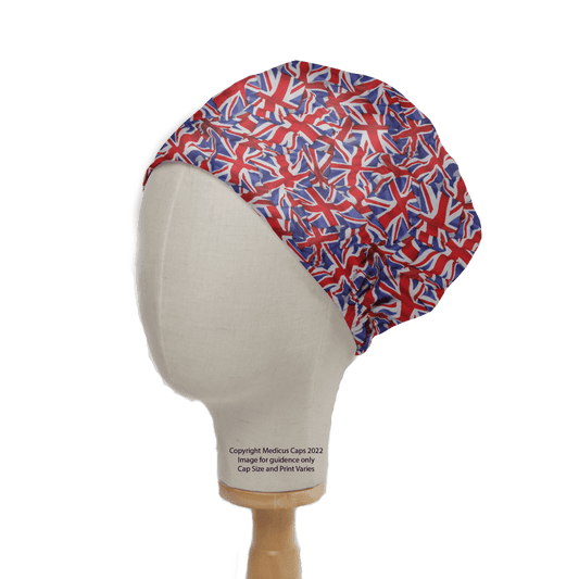 The Medicus Scrub Caps Flag UK Scrub Cap features a vibrant design of overlapping Union Jack flags in bold red, white, and blue colors, crafted for comfort and eco-friendliness.