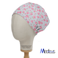 The mannequin displays the eco-friendly Medicus Scrub Caps Floral Roses Small On Blue Scrub Cap, featuring a pink and green rose pattern on white, showcased in profile with subtle branding.