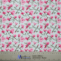 The Floral Tree Blossom Scrub Cap by Medicus Scrub Caps features pink magnolia flowers and branches on a light background, perfect for healthcare professionals. Displayed with a ruler at the bottom, it shows measurements in inches and centimeters.
