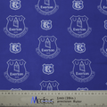 The Football Club Everton Scrub Cap from Medicus Scrub Caps features a blue fabric with white Everton FC crests, EFC, 1878, and a banner. A measuring ruler is visible at the bottom.