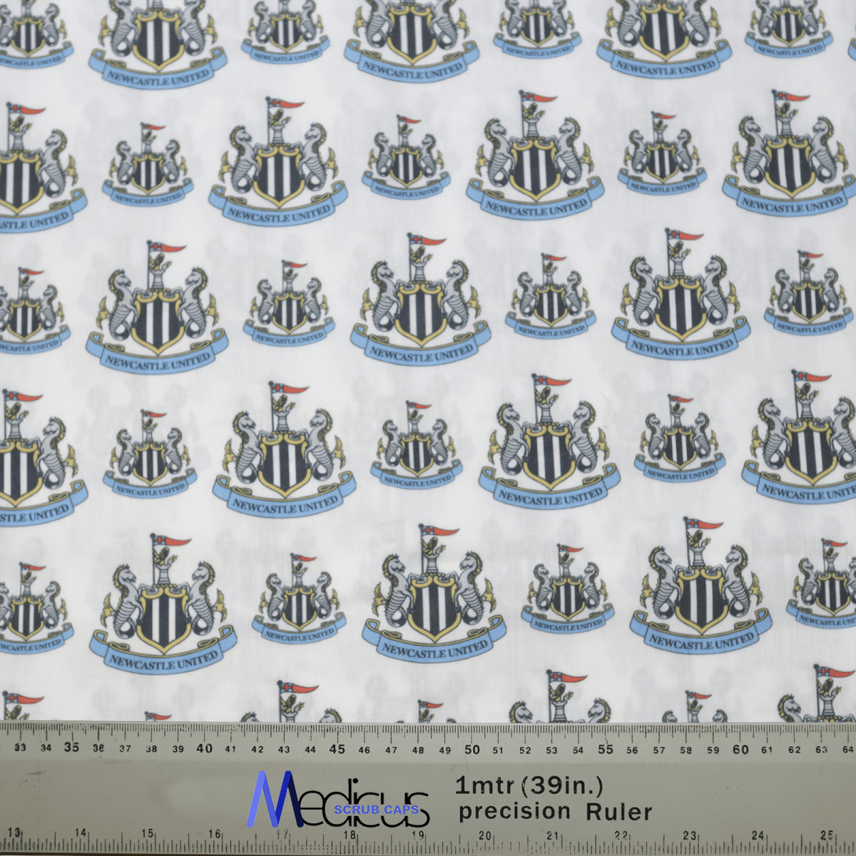 The Football Club Newcastle Scrub Cap by Medicus Scrub Caps features patterned fabric with club crests, black and white shields, lions, and flags. A 1-meter ruler at the bottom symbolizes sustainability and healthcare excellence.