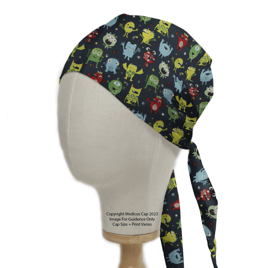 Mannequin wearing the Germ Monsters #2 Scrub Cap by Medicus Scrub Caps, a healthcare essential featuring colorful cartoon monsters on a dark background.