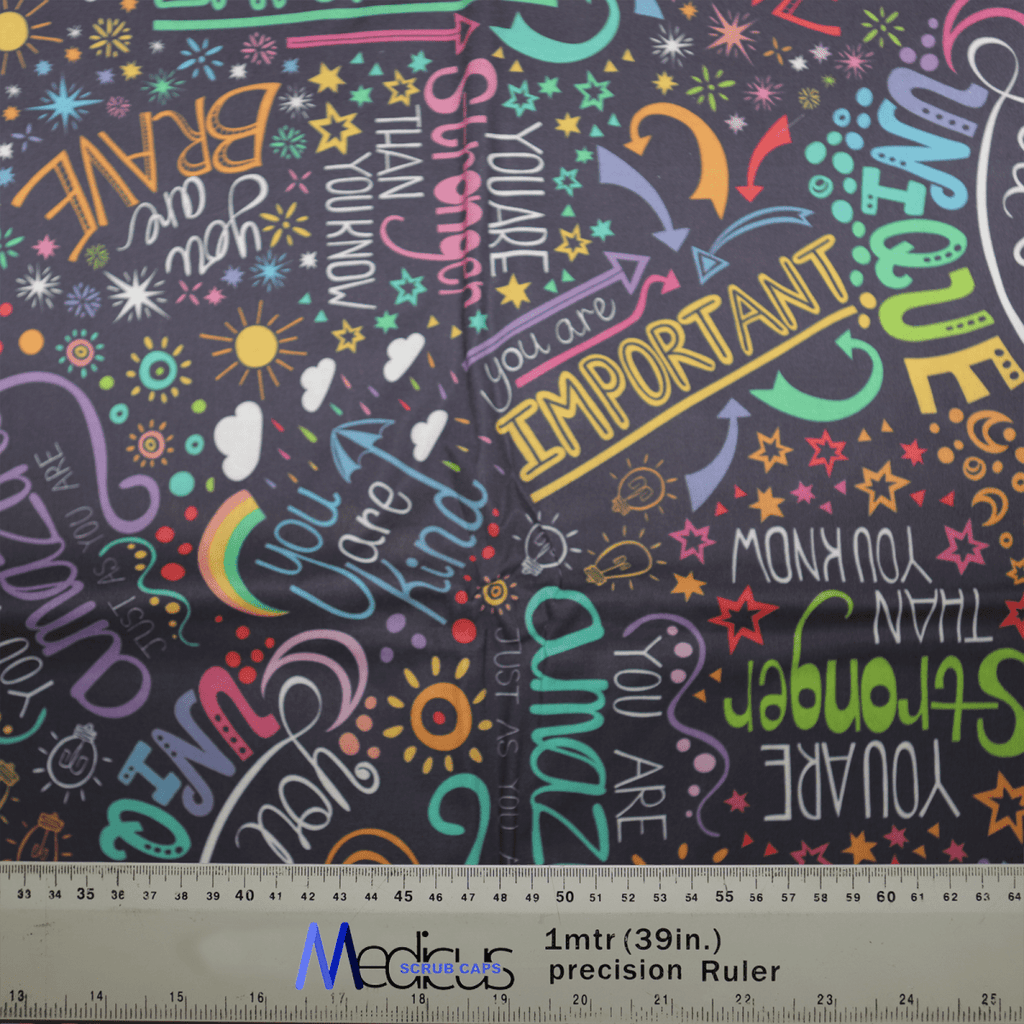 The Good Vibes Scrub Cap by Medicus Scrub Caps features vibrant motivational words like You are Stronger, You are Important, and You are Amazing on a dark background. It includes a ruler in inches and centimeters, ideal for designing this eco-friendly accessory.
