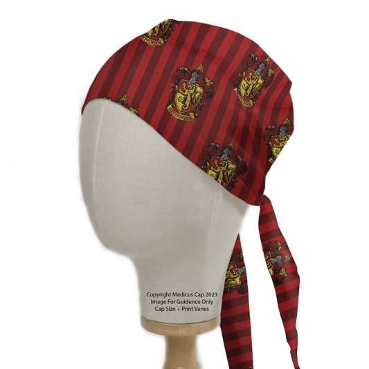 The Harry Potter Gryffindor Scrub Cap from Medicus Scrub Caps features a stunning red and maroon stripe with a lion crest, embodying the Gryffindor spirit. Perfect for fans or bold style lovers, this reusable cap adds a magical touch to any outfit.