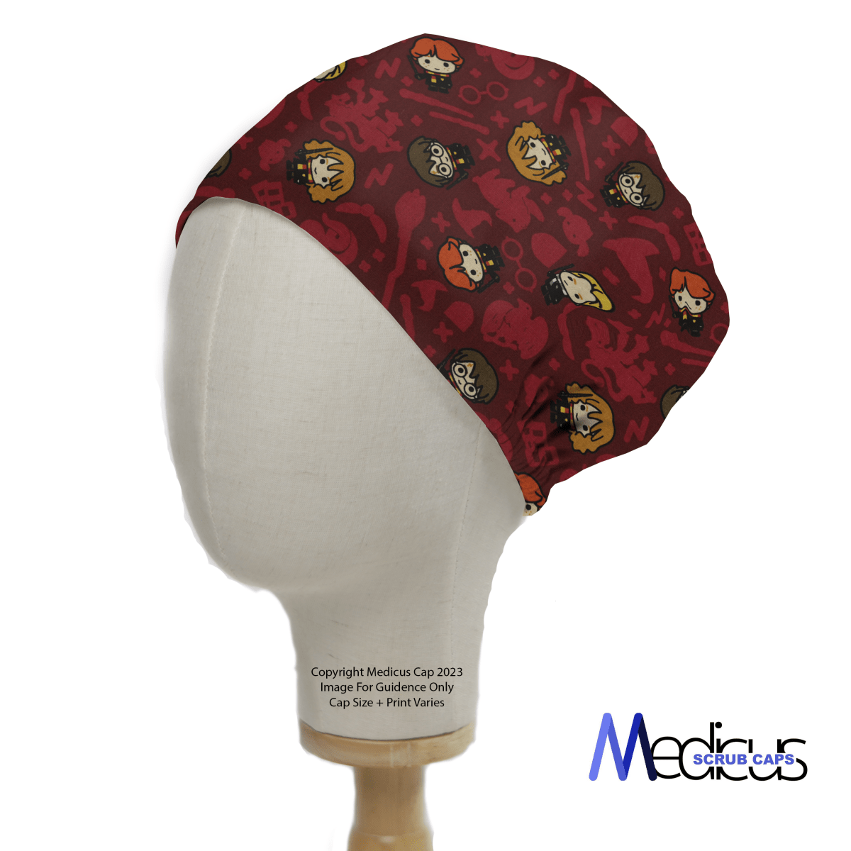 A mannequin head wears a Medicus Scrub Caps Harry Potter Kawaii Characters Red Scrub Cap, featuring cute wizarding characters on a deep red background.